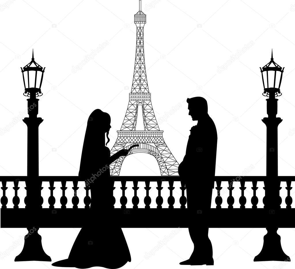 Wedding couple in front of Eiffel tower in Paris silhouette