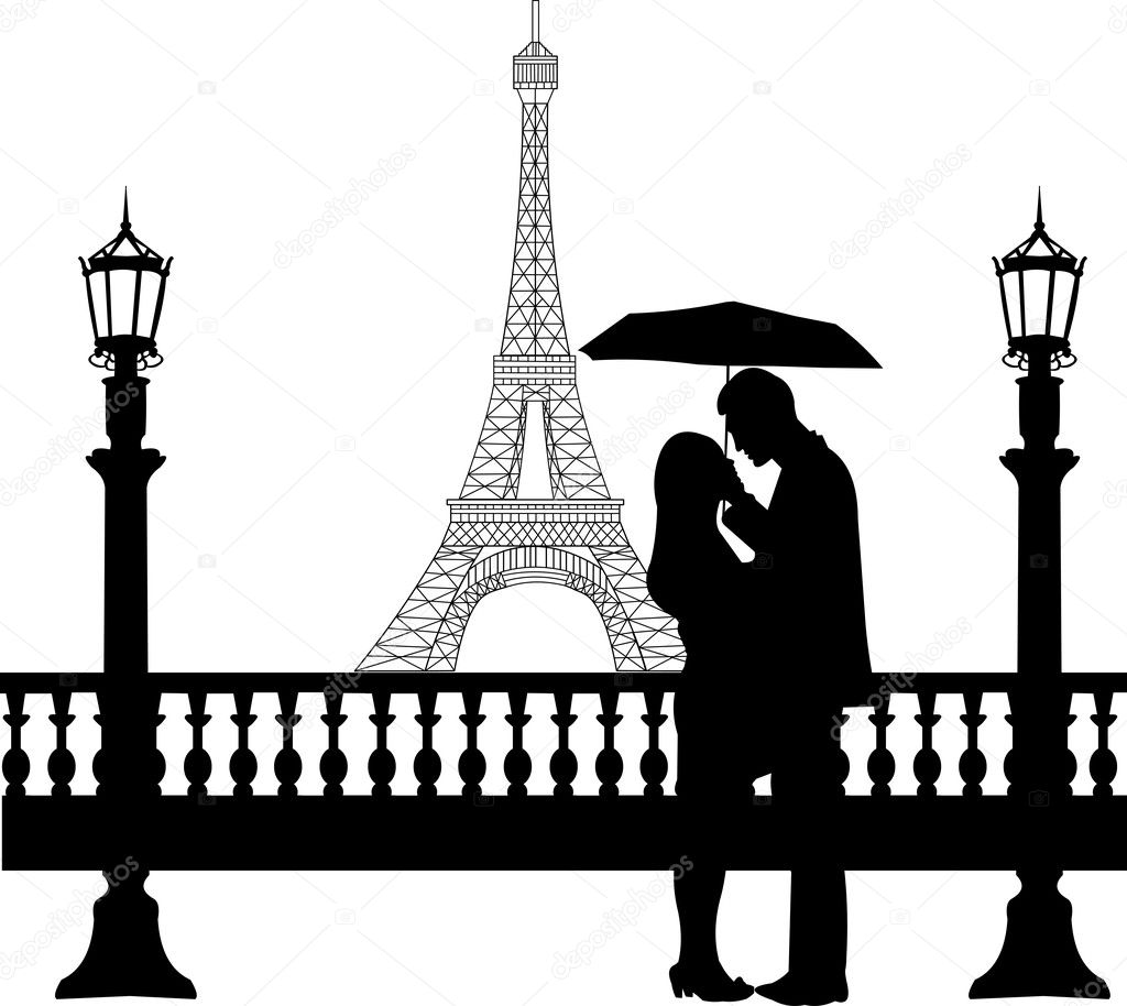 Romantic couple in front of Eiffel tower in Paris under umbrella silhouette