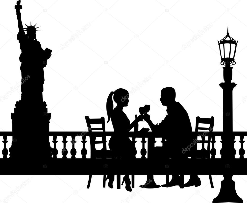 Romantic couple in New York under umbrella silhouette