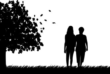 Anne ve kızı sonbahar veya sonbahar parkta yürüyüş