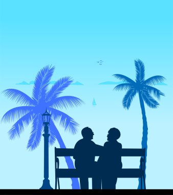 palmiye ağacının altında sahilde yaşlı çiftin güzel emekli