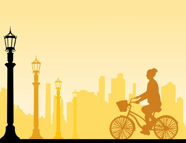 Girl bike ride on the street silhouette — Stock Vector