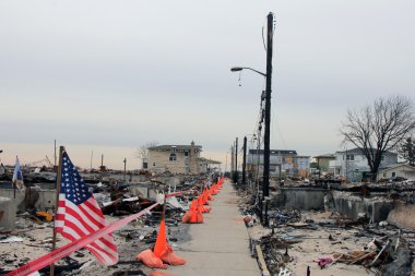 Hurricane devastated area in Breezy Point,NY three months after Hurricane Sandy clipart