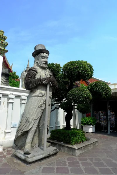 Kinesisk statue på Wat Pho tempel, Bangkok - Stock-foto