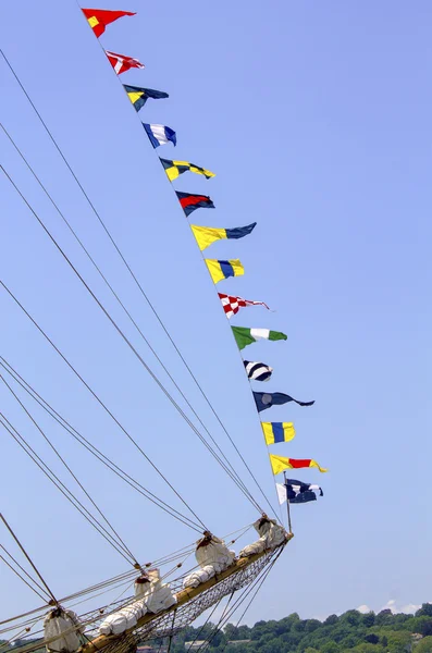 Tall ship with nautical flags — Stock Photo, Image