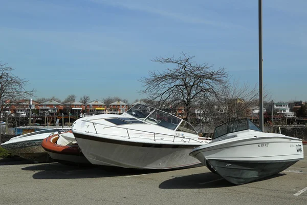 Boats cast ashore in the aftermath of Hurricane Sandy five months after storm in Brooklyn, NY