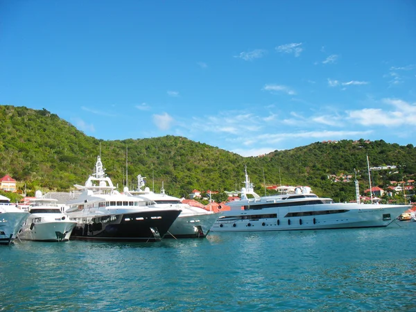Mega yachts in Gustavia Harbor at St. Barths — Stock Photo, Image