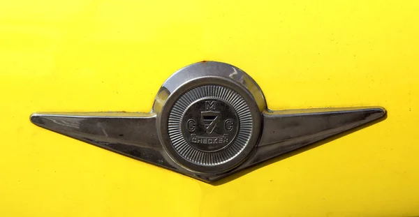 Checker Taxi Cab emblem produced by the Checker Motors Corporation — Stock Photo, Image