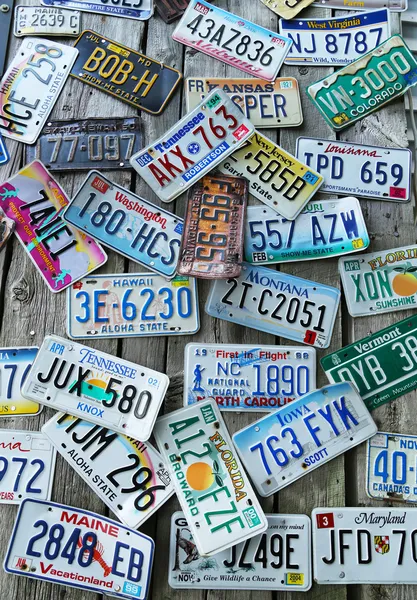 Old car license plates on the wall — Stock Photo, Image