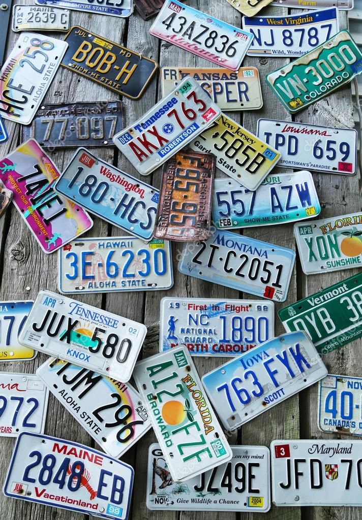 Old car license plates on the wall — Stock Photo © zhukovsky 28378843