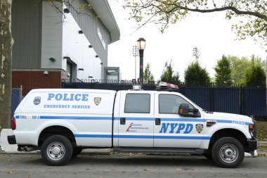NYPD emergency service unit providing security near National Tennis Center during US Open 2013 clipart