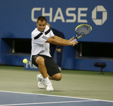 Mikhail youzhny sırasında çeyrek final maçı bize açık 2013 novak djokovic karşı profesyonel tenis oyuncusu