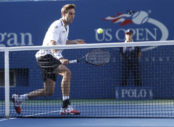 职业网球球员马塞尔 · 格兰诺耶尔在第四轮匹配在我们反对 novak djokovic 开放 2013 — 图库照片