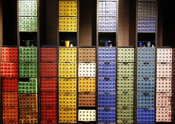 Variety of coffee capsules in Nespresso store in Paris — Stock Photo, Image