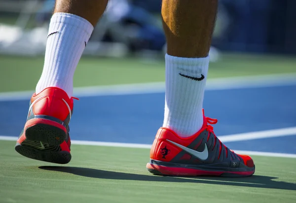 Seventeen times Grand Slam champion Roger Federer wears custom Nike tennis shoes during match at US Open 2013 — Stock Photo, Image