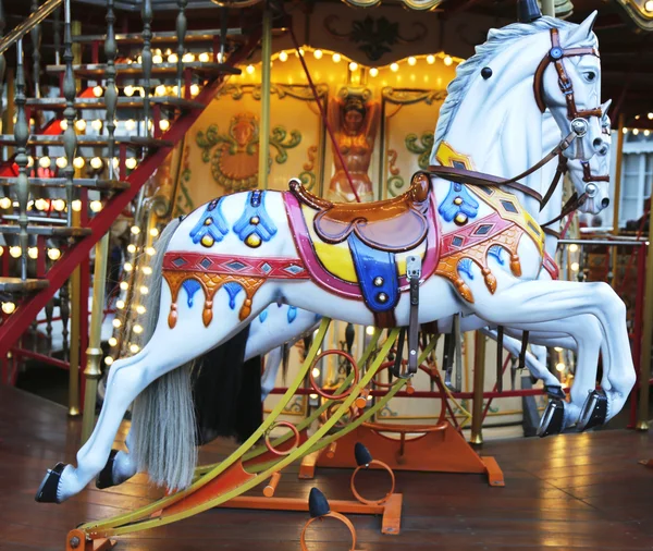 Horses on a traditional fairground carousel in Avignon, France — Stock Photo, Image