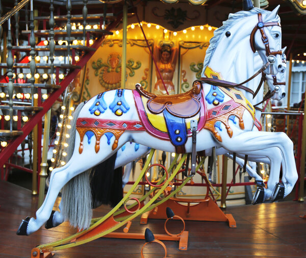 Horses on a traditional fairground carousel in Avignon, France