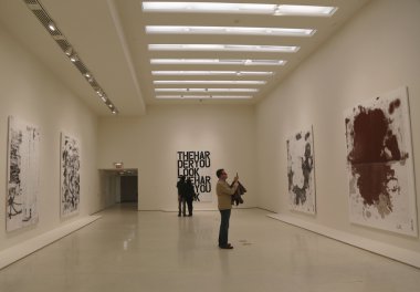Visitors in Solomon R Guggenheim Museum of modern and contemporary art in New York during Christopher Wool exhibition clipart