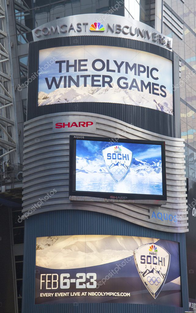 NEW YORK - JANUARY 26: Comcast NBC Universal billboard decorated with Sochi 2014 XXII Olympic Winter Games logo near Times Square in Midtown Manhattan on January 26, 2014