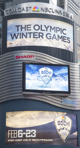 Comcast NBC Universal billboard decorated with Sochi 2014 XXII Olympic Winter Games logo near Times Square in Midtown Manhattan