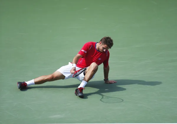 Jogador de tênis profissional Stanislas Wawrinka durante partida semifinal no US Open 2013 contra Novak Djokovic — Fotografia de Stock