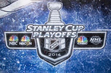 Stanley Cup Playoffs 2014 logo displayed at the NBC Experience Store window in midtown Manhattan clipart