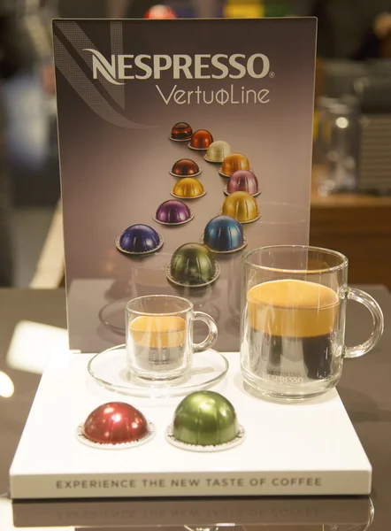 Variety of coffee capsules in Nespresso store — Stock Photo, Image