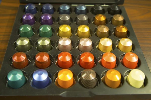 Variety of coffee capsules in Nespresso store in New York — Stock Photo, Image