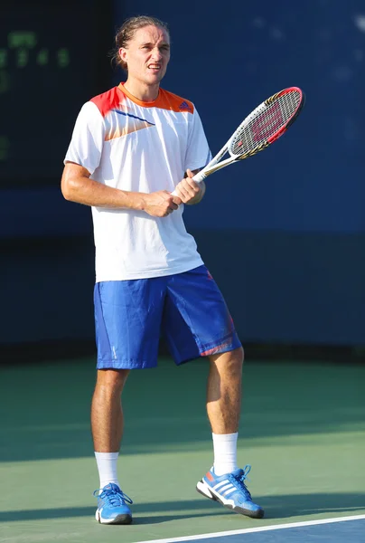 Jogador profissional de tênis Alexandr Dolgopolov da Ucrânia durante a primeira rodada de duplas no US Open 2013 — Fotografia de Stock