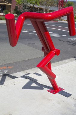 Can't stop statue by artist Bruce Johnson at public art walk in town of Yountville clipart
