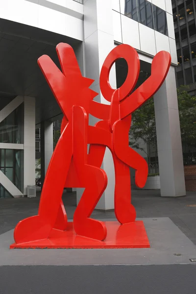 Figure balancing on dog by Kieth Haring in Manhattan — Stock Photo, Image