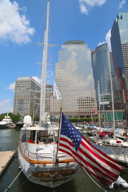 Tall ships docked at the North Cove Marina at Battery Park in Manhattan clipart