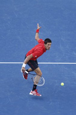 US Open 2013 finalist Novak Djokovic during final match against champion Rafael Nadal clipart