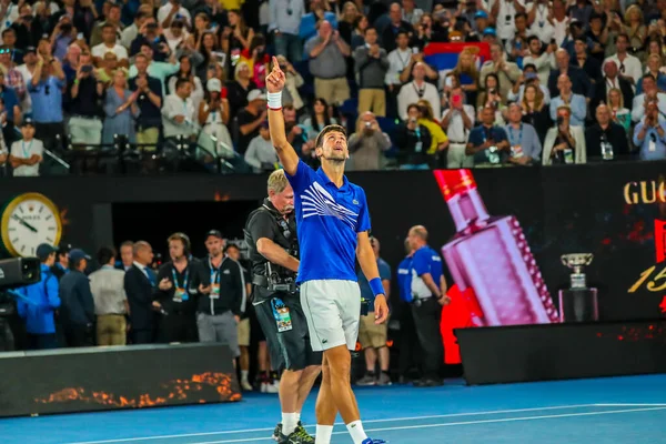 MELBOURNE, AUSTRALIA - 27 Ocak 2019: Sırbistan Grand Slam şampiyonu Novak Cokoviç, Melbourne Park 'ta oynanan 2019 Avustralya Açık' ta Rafael Nadal ile oynadığı final maçı sonrasında zaferini kutladı 