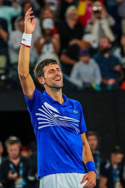 MELBOURNE, AUSTRALIA - 27 Ocak 2019: Sırbistan Grand Slam şampiyonu Novak Cokoviç, Melbourne Park 'ta oynanan 2019 Avustralya Açık' ta Rafael Nadal ile oynadığı final maçı sonrasında zaferini kutladı 