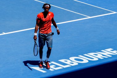 MELBOURNE, AUSTRALIA - JANUARY 24, 2016: Professional tennis player Gael Monfis of France in action during  2016 Australian Open round 4 match  in Melbourne Park