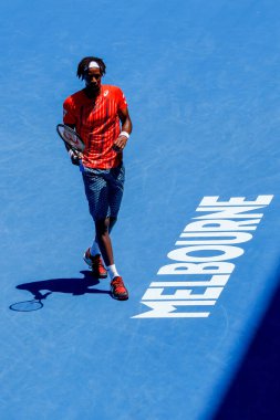 MELBOURNE, AUSTRALIA - JANUARY 24, 2016: Professional tennis player Gael Monfis of France in action during  2016 Australian Open round 4 match  in Melbourne Park