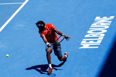 MELBOURNE, AUSTRALIA - JANUARY 24, 2016: Professional tennis player Gael Monfis of France in action during  2016 Australian Open round 4 match  in Melbourne Park
