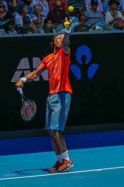MELBOURNE, AUSTRALIA - JANUARY 24, 2016: Professional tennis player Gael Monfis of France in action during  2016 Australian Open round 4 match  in Melbourne Park