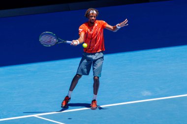 MELBOURNE, AUSTRALIA - JANUARY 24, 2016: Professional tennis player Gael Monfis of France in action during  2016 Australian Open round 4 match  in Melbourne Park