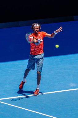 MELBOURNE, AUSTRALIA - JANUARY 24, 2016: Professional tennis player Gael Monfis of France in action during  2016 Australian Open round 4 match  in Melbourne Park
