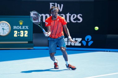 MELBOURNE, AUSTRALIA - JANUARY 24, 2016: Professional tennis player Gael Monfis of France in action during  2016 Australian Open round 4 match  in Melbourne Park