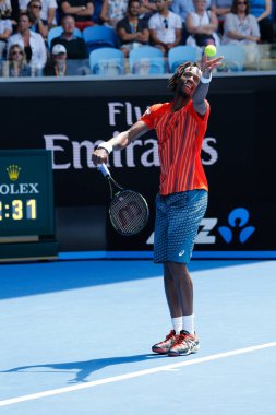 MELBOURNE, AUSTRALIA - JANUARY 24, 2016: Professional tennis player Gael Monfis of France in action during  2016 Australian Open round 4 match  in Melbourne Park
