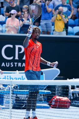 MELBOURNE, AUSTRALIA - JANUARY 24, 2016: Professional tennis player Gael Monfis of France celebrates victory after  2016 Australian Open round 4 match  in Melbourne Park