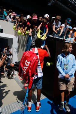 MELBOURNE, AUSTRALIA - JANUARY 24, 2016: Professional tennis player Gael Monfis of France signs autographs at Margaret Court Arena after victory at 2016 Australian Open round 4 match in Melbourne Park
