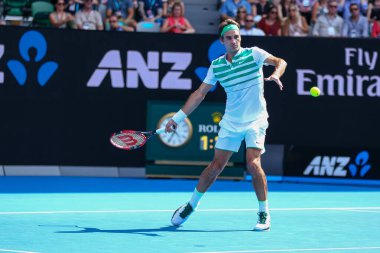 MELBOURNE, AUSTRALIA - JANUARY 26, 2016: Seventeen times Grand Slam champion Roger Federer of Switzerland in action during 2016 Australian Open quarterfinal match in Melbourne Park
