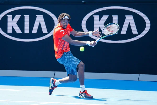 MELBOURNE, AUSTRALIA - JANUARY 24, 2016: Professional tennis player Gael Monfis of France in action during  2016 Australian Open round 4 match  in Melbourne Park