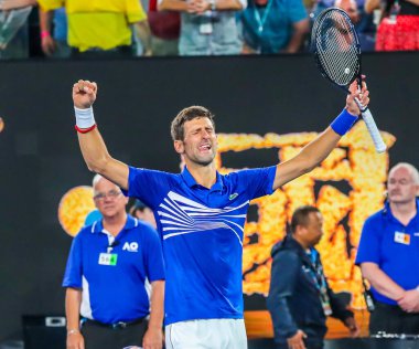 MELBOURNE, AUSTRALYA - 25 Ocak 2019 Grand Slam Şampiyonu Novak Cokoviç, Melbourne Park 'ta oynanan 2019 Avustralya Açık' taki yarı final karşılaşması sonrasında zaferini kutladı
