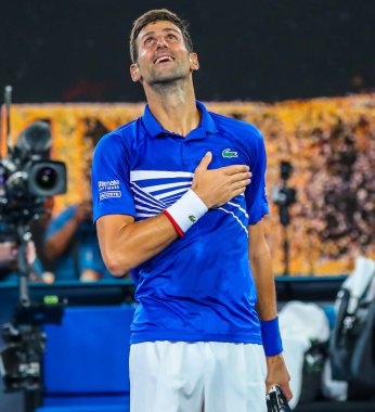 MELBOURNE, AUSTRALYA - 25 Ocak 2019 Grand Slam Şampiyonu Novak Cokoviç, Melbourne Park 'ta oynanan 2019 Avustralya Açık' taki yarı final karşılaşması sonrasında zaferini kutladı
