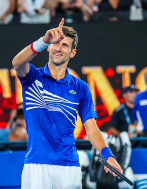 MELBOURNE, AUSTRALYA - 25 Ocak 2019 Grand Slam Şampiyonu Novak Cokoviç, Melbourne Park 'ta oynanan 2019 Avustralya Açık' taki yarı final karşılaşması sonrasında zaferini kutladı